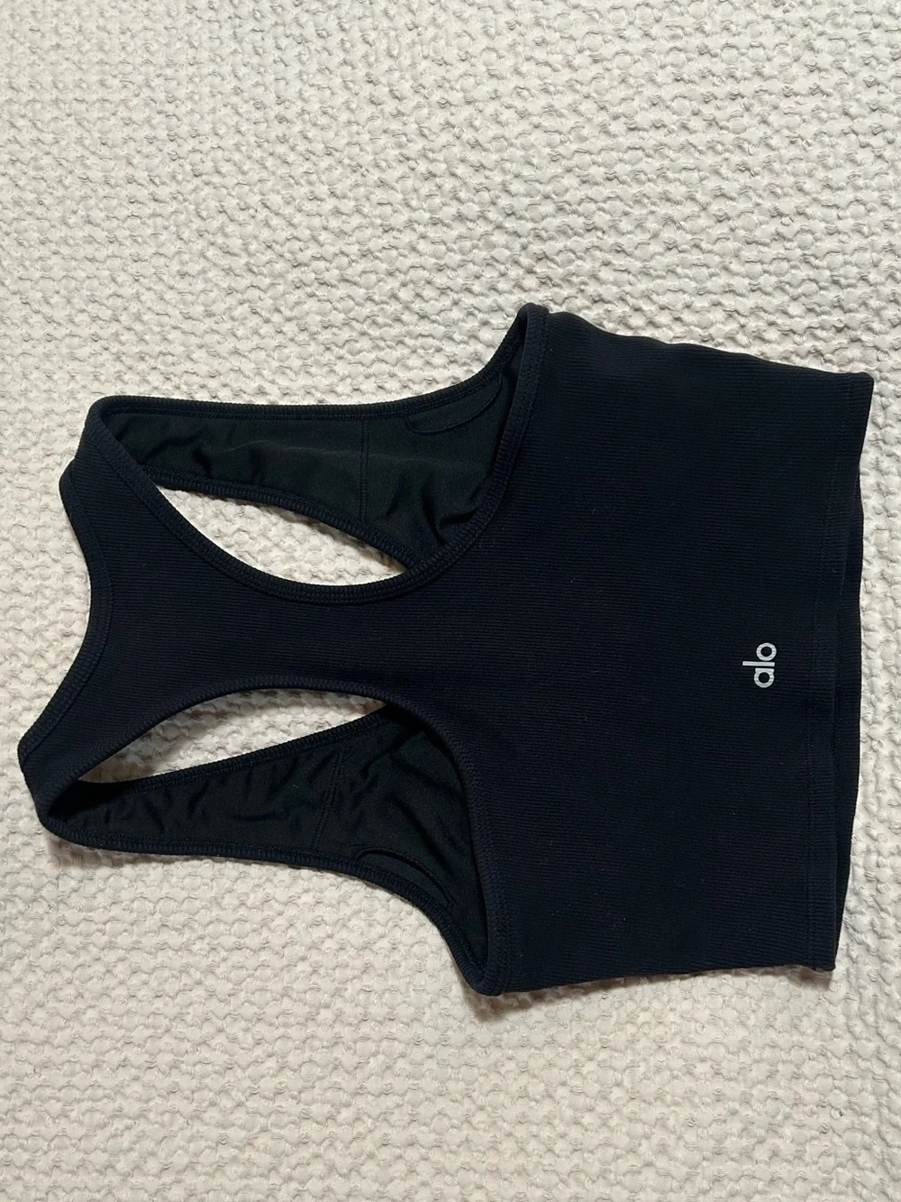ALO Goddess Ribbed Cropped Racerback Tank in Black